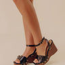 The Trisha Faux Leather Wedge in Black Image - 1