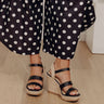 The Alana Faux Leather Wedge in Black Image - 1