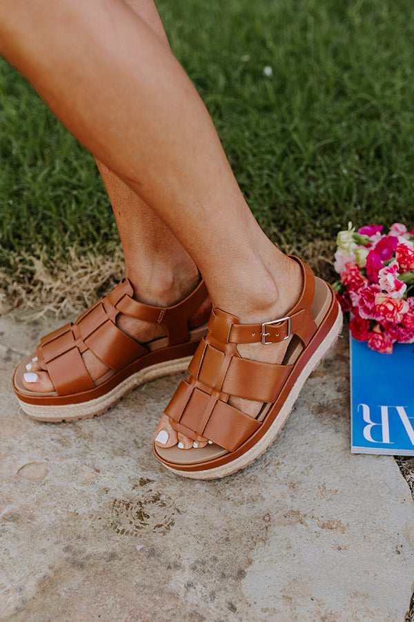 A chic brown faux leather espadrille, perfect for everyday wear.