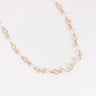 Sweet Charmer Necklace in Gold Image - 1