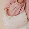Easy To Style Faux Leather Woven Purse in Ivory Image - 1