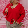 A cozy knit sweater top designed for a flattering and comfortable fit.