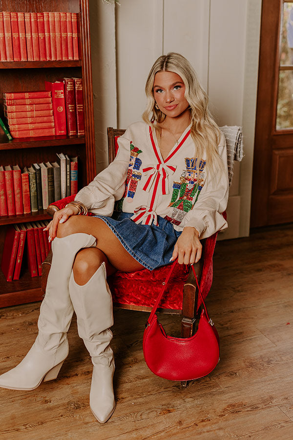 Stunning red cropped Christmas sweater, perfect for fall and winter wardrobes with a touch of seasonal flair and chic comfort.