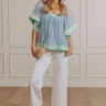 Blissful Smile Babydoll Top in Sky Blue Image - 1