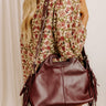 Metropolitan Muse Faux Leather Fringe Purse in Merlot Image 1