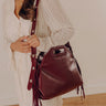 Metropolitan Muse Faux Leather Fringe Purse in Merlot Image - 1