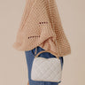The Staci Faux Leather Quilted Crossbody in Ivory Image - 1