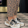 The Dash Faux Leather Sneaker in Gold Image - 1