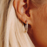 Melinda Maria Beacon 1 inch Hoop Earrings in Silver Image - 1