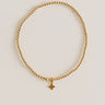 Enewton Classic Gold 2mm Bracelet in Signature Cross Small Gold Charm Image - 1