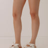 Lil Bit Knotty Faux Leather Sandal in Ivory Image - 1