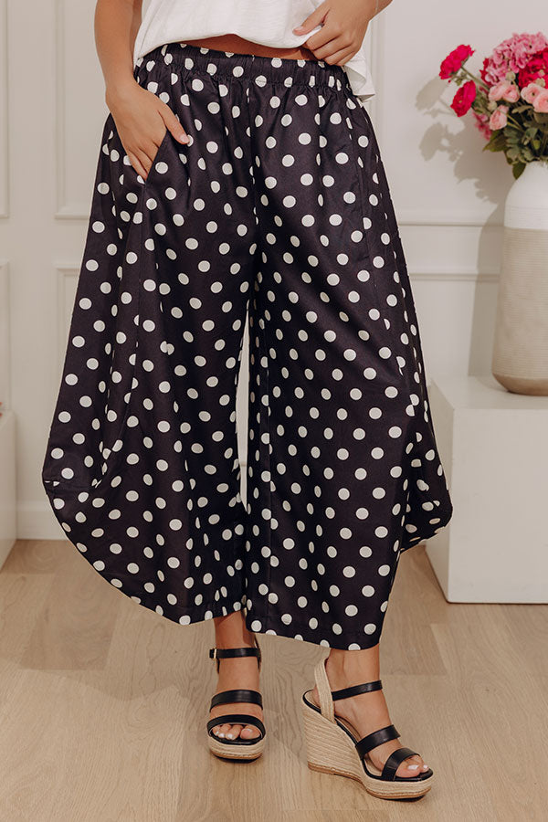 The Rowena Midrise Polka Dot Barrel Leg Pants in Black