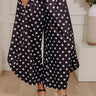 The Rowena Midrise Polka Dot Barrel Leg Pants in Black Image - 1