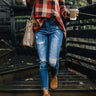 The Naomi Mid Rise Distressed Skinny Image - 1