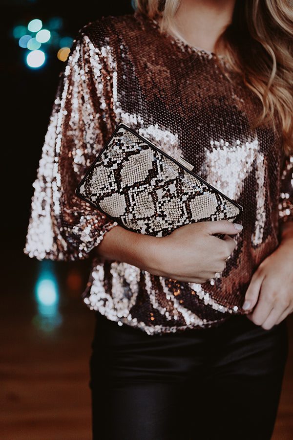 Low Key Obsessed Snake Print Clutch