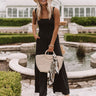 Dreams of Destin Smocked Jumpsuit in Black Image - 1