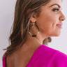 The Latest Scoop Earrings In Black Image - 1