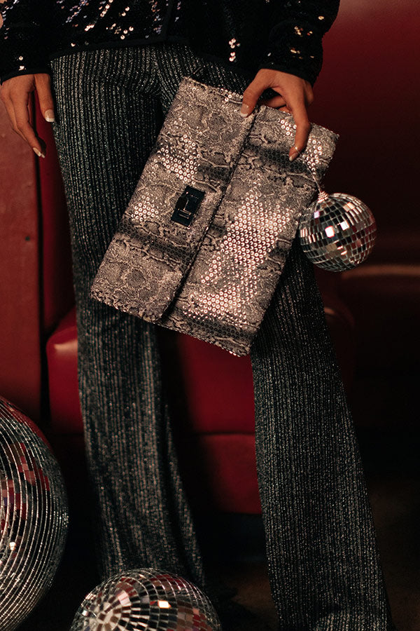 Hey, Showstopper Snake Print Clutch