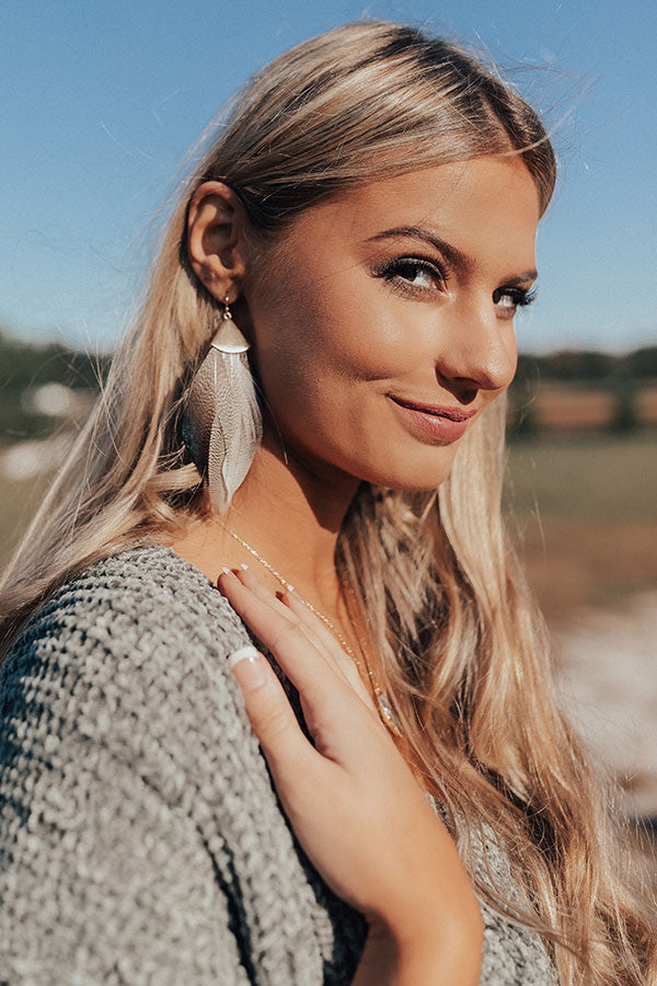 Feeling Flirtatious Feather Earrings In Taupe
