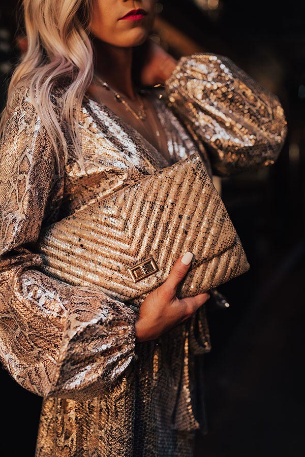 Delicate Details Faux Leather Snake Print Clutch In Iced Latte