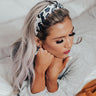 Flirty And Fashionable Leopard Headband In White Image - 1
