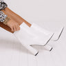 The Charlee Faux Leather Ankle Bootie In White Image - 1
