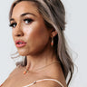Kendra Scott Demi Gold Huggie Earrings in Papaya Mother Of Pearl Image - 1