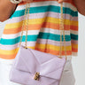 Captivated By Grace Faux Leather Crossbody In Lavender Image - 1