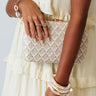 Sweet Sound Woven Clutch In White Image - 1