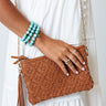 New Attention Woven Clutch In Brown Image - 1