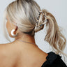 Drop The Mic Hair Claw In Brown Cow Print Image - 1