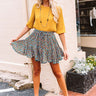 Love On A Loop Pleated Shift Top In Mustard Image - 1
