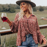 The Ivee Floral Babydoll Top in Rust Curves Image - 1