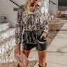 The Ivee Floral Babydoll Top in Black Image - 1