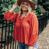 The Bayle Babydoll Shift Top in Rust Curves Image - 1