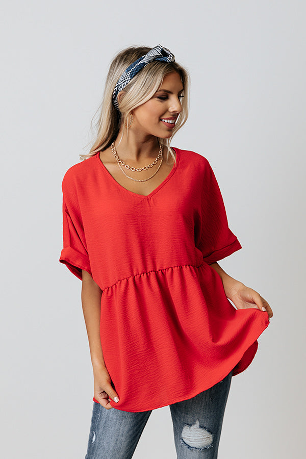 Spilling Secrets Babydoll Top In Red