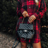 Looking At London Faux Leather Backpack In Black Image - 1