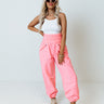 The Huxley High Waist Windbreaker Pants In Neon Pink Image - 1