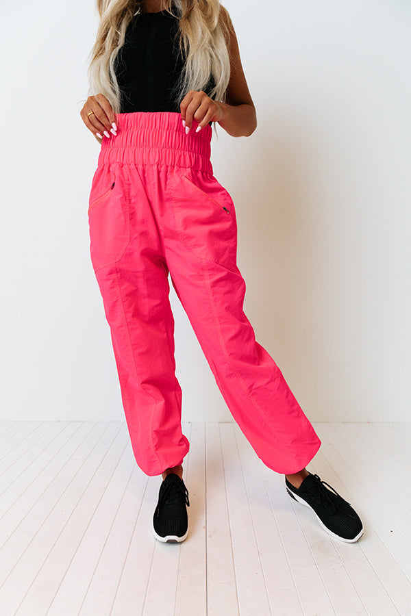 The Huxley High Waist Windbreaker Pants In Neon Hot Pink Image - 2