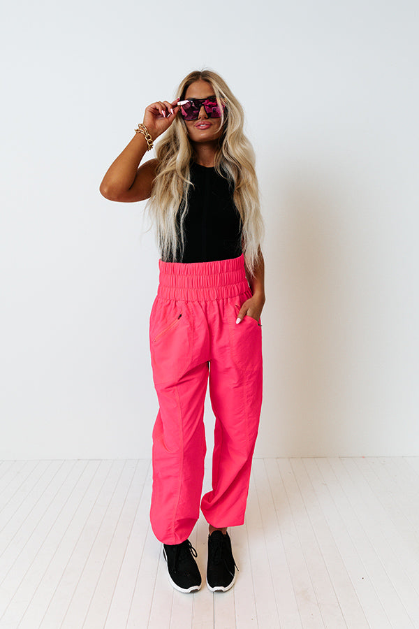 The Huxley High Waist Windbreaker Pants In Neon Hot Pink Image - 1
