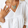 Kendra Scott Ember Gold Butterfly Statement Necklace in Bronze Veined Turquoise Magnesite Red Oyster Image - 1