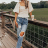 The Belmore Ruffle Bodysuit In Cream Image - 1