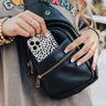 Highway Home Faux Leather Sling Backpack In Black Image - 1