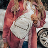 Highway Home Faux Leather Sling Backpack In White Image - 1