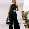 Private Jet Hopping Smocked Jumpsuit in Black Image - 1
