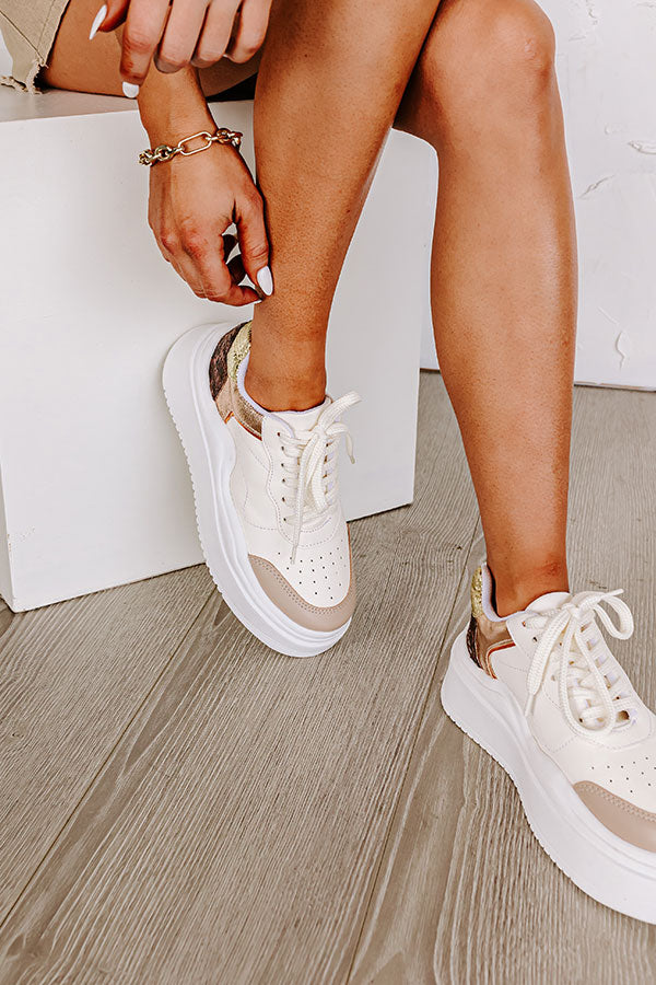 The Avianna Faux Leather Sneaker In Gold Image - 1