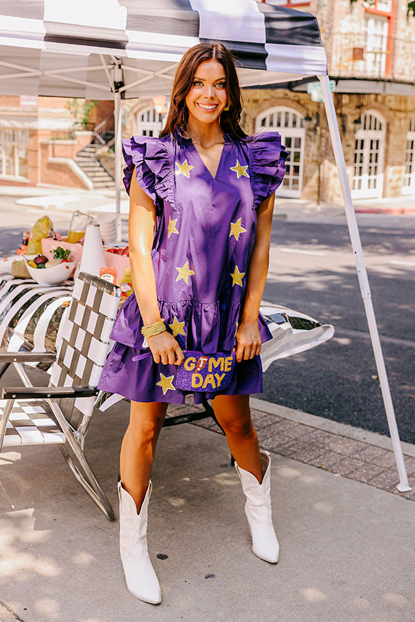 Under The Stadium Lights Ruffle Mini Dress in Purple