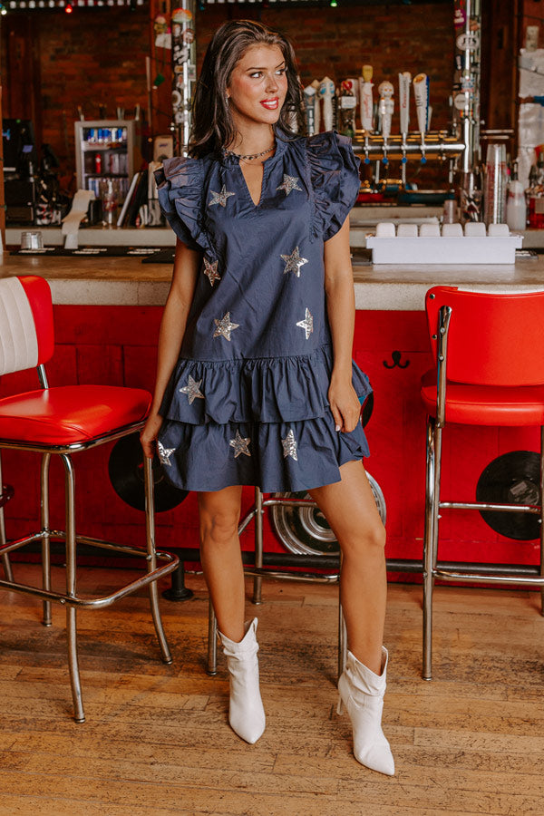 Under The Stadium Lights Ruffle Mini Dress in Navy Image - 4
