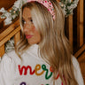 Christmas Carol Embellished Headband In Pink Image - 1